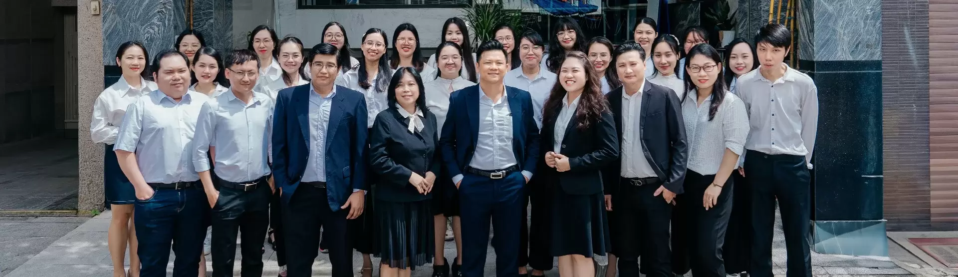 Green Sun translation and localization team outside the company office